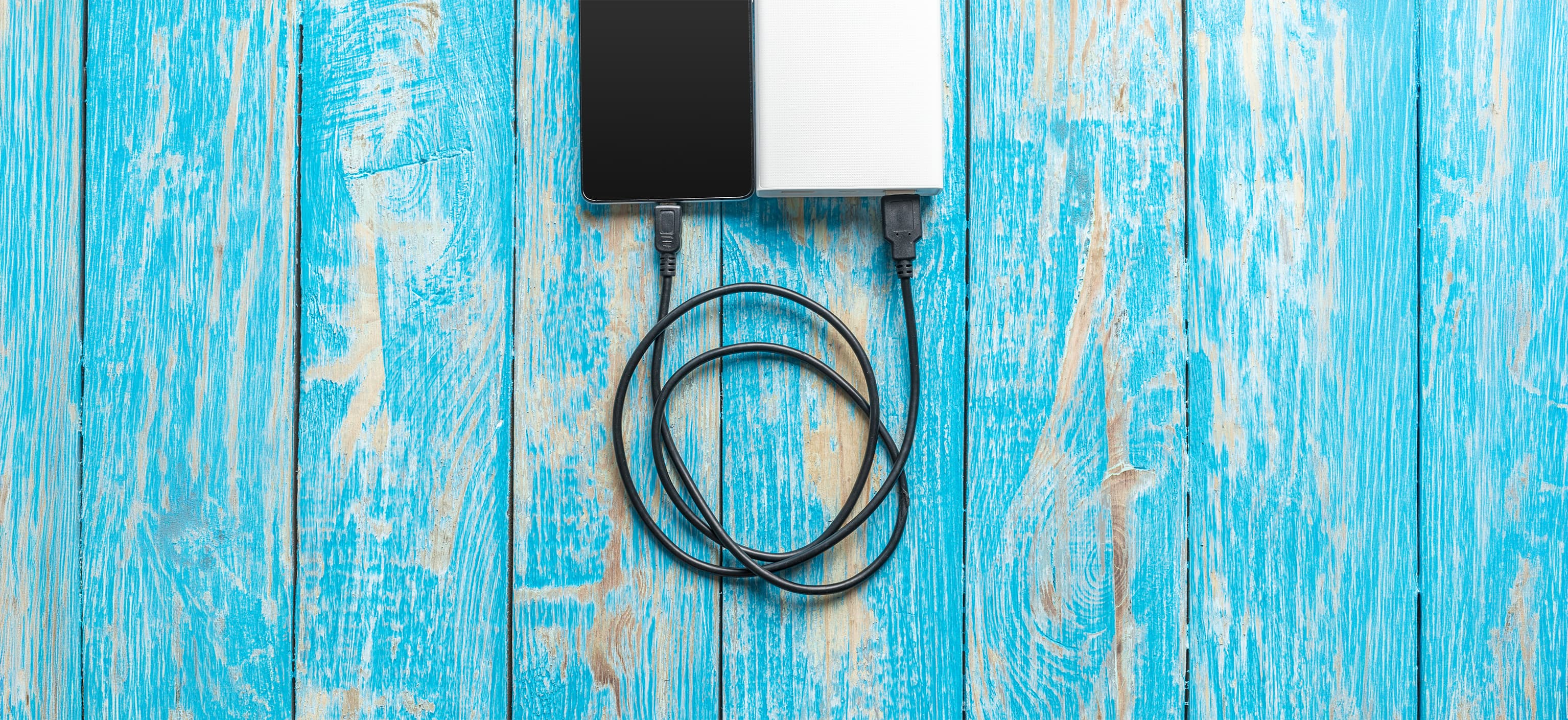 Phone charging from a portable power bank via a cable