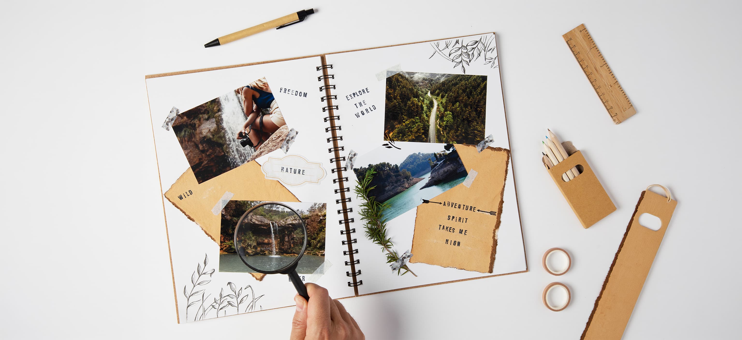 Travel scrapbook journal with taped-in photos of nature and adventure